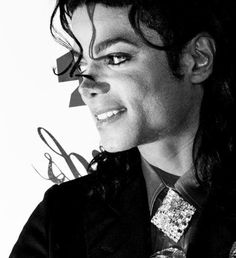 a black and white photo of michael jackson