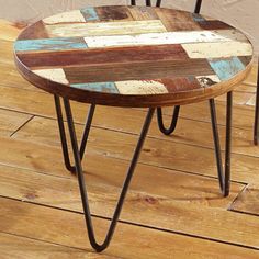 two chairs sitting on top of a wooden floor