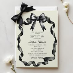 an elegant black and white bow themed sweet 16 birthday party with ribbon on the front