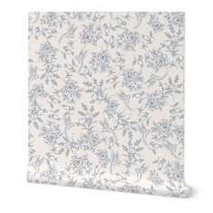 a white and blue floral wallpaper with flowers on the side, in front of a white background