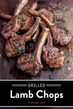 grilled lamb chops on a cutting board with parsley