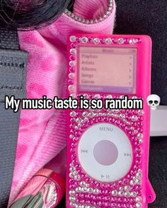 a pink ipod case with the words my music taste is so random in front of it