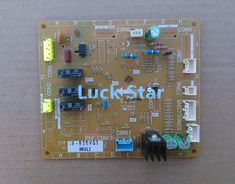 a circuit board with the words luckstar written on it and some wires attached to it