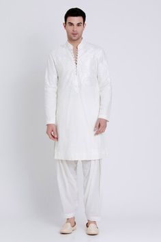 Ivory embroidered linen kurta featuring geometric pattern silk resham detailing. Paired with draped pant. - Aza Fashions White Linen Kurta With Resham Embroidery, Traditional Linen Kurta With Resham Embroidery, Elegant White Linen Kurta, Traditional Linen Kurta For Eid, Traditional Embroidered Linen Wear, Embroidered Linen Traditional Wear, Traditional Linen Wear For Eid, Festive Linen Kurta With Embroidered Border, Festive Linen Traditional Wear