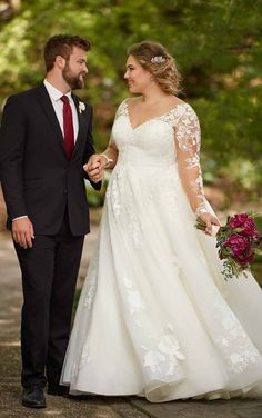 the bride and groom are holding hands