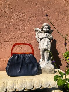 This here is a gorgeous bag! It was skillfully crafted from navy blue leather and lucite by Etra. The pleats in the leather and the lucite handles add a beautiful touch of sophistication and elegance. The closing is quite unique since the handles are meant to overlap each other to snap close. This bag is in great vintage condition with just a few scuffs and scratches on the leather, and a few knicks in handle (not noticeable at all). Measurements: Height: 8 inches Length: 10 inches Depth: 4 inch Alligator Handbags, 1960s Style, Resin Frame, Straw Clutch, Favorite Handbags, Croc Leather, 1960s Fashion, Retro Mid Century, Gorgeous Bags