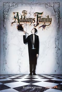 the addams family movie poster with a man in a tuxedo holding an umbrella