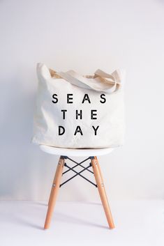 Life is better by the sea — and even better with the Seas The Day Tote, perfect for sunny beach days and vacation essentials! Measures 20"W x 15"H x 5"D100% Cotton Farmers Market Tote Bag, Perfect Beach Bag, Resting Beach Face, Aloha Beaches, Market Tote, Grocery Shop, Beach Tote Bags, Beach Tote, Beach Babe