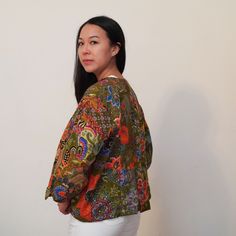 This is a washable printed batik robe/ kimono handmade by artisans, thick duster and home jacket. Because of the upcycled material and handmade nature of this item, each batik quilt kimono is not alike. The print will be of slightly different pattern and color but in variation of black, blue, pink, purple, green mix pattern. This jacket is NOT reversible This thick quilted patchwork robe is handmade by artisans in Java using upcycled printed fabric from leftover fabric sourced from clothing manu Batik Outer, Multicolor Cotton Kimono With Batik Print, Multicolor Patchwork Robe With Kimono Sleeves, Luxury Bohemian Patchwork Kimono, Artisan Clothing, Multicolor Kimono With Block Print, Batik Clothing, Flower Kimono, Boho Robes