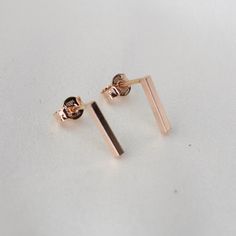 "14K Rose Gold Bar Earrings. 14K Rose Gold Simple Earrings. 14K Solid Rose Gold Minimalist Earrings 14K solid rose gold bar. It is 1.5mm wide. (Please select the length of bars : 3/8\", 1/2\" 5/8\")  The model in the picture wears 3/8\" bar earrings. 14K solid rose gold ear wire" Minimalist 14k Rose Gold Linear Earrings, Dainty Rose Gold Linear Earrings For Formal Occasions, Rose Gold 14k Linear Earrings For Pierced Ears, Everyday Rose Gold Sterling Silver Linear Earrings, Modern Rose Gold Linear Earrings For Formal Occasions, Minimalist 14k Rose Gold Earrings, Minimalist Rose Gold Linear Earrings For Gift, Minimalist Rose Gold Linear Earrings Gift, Dainty 14k Rose Gold Linear Earrings