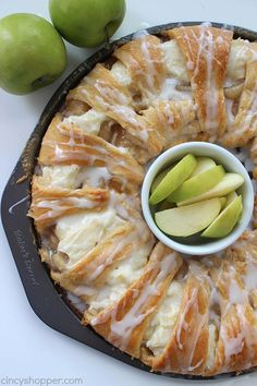 caramel apple cream cheese ring with apples on the side and in bowls next to it