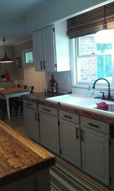 the kitchen is clean and ready for us to use in its new owner's home