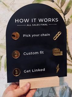 a person holding up a sign that says how it works all sales final pick your chain custom fit get linked