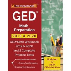 the gre math workbook is in front of a desk with books and pencils