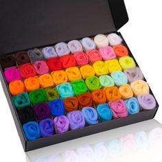 a box filled with lots of different colored items