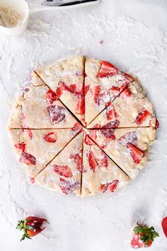 strawberry shortbread pizza cut into eight slices