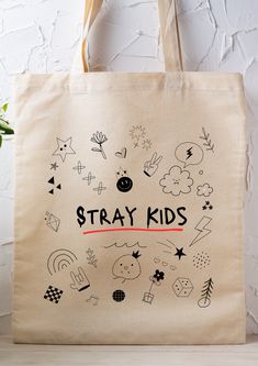 a tote bag with the words stay kids printed on it