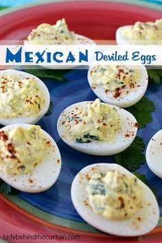 mexican deviled eggs on a plate with cilantro