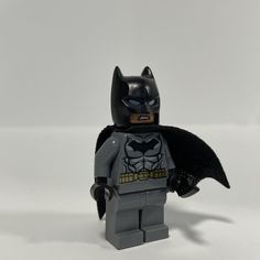 LEGO Minifigure Super Hero BATMAN Dark Bluish Grey Suit Gold Belt DC comics Used. Legs have some small nicks and the capes holes are warn the head also has a black mark but is not visible with his mask on (see photos) I offer combined shipping! Combined shipping is a great way to receive discounted prices on shipping when ordering multiple items from my store. All you need to do is add the items you want from my store to your cart, and combined shipping will be automatically applied. Bluish Grey Suit, Batman Dark, Lego Minifigure, Grey Suit, Gold Belt, Gold Belts, Bluish Gray, Dc Comic, Lego Minifigures