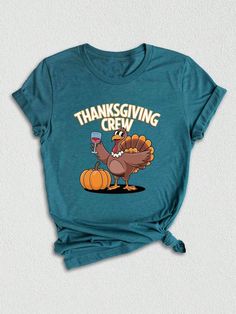 Introducing our Thankful Turkey Tee, the perfect addition to your Thanksgiving ensemble! This Fall-inspired shirt is designed to celebrate the spirit of Thanksgiving, bringing together the themes of Thanksgiving Family, Friendsgiving, and Thanksgiving Dinner all in one stylish garment. Crafted with love and attention to detail, this tee is made from premium, soft fabric that ensures comfort throughout the festive season. The rich autumn colors and intricate Thanksgiving-inspired design make it a standout piece for any Thanksgiving gathering or Friends Thanksgiving event.

Featuring a playful and adorable turkey design, our Thankful Turkey Tee showcases the essence of the holiday. The vibrant orange and brown hues capture the essence of the fall season, while the intricate details of the tu Thanksgiving T-shirts, Native American Thanksgiving Shirt, Thanksgiving Shirt Sng, Womens Thanlsgiving Shirt, Thanksgiving Graphic Print Crew Neck T-shirt, Thanksgiving Cotton T-shirt With Graphic Print, Thanksgiving Cotton Graphic Print T-shirt, Friends Thanksgiving, Thanksgiving Family