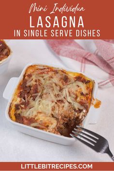 lasagna in a white casserole dish with a fork