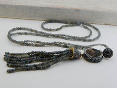 labradorite gemstone , druzy gemstone swarovski crystal stone labradorite tassel necklace Necklace Length 21 inç. ( 53 cm. ) Neck Circumference 30 inç. ( 76 cm. ) United Shipping 2-3 days ups extra no charge sending requests and suggestions, please feel free to convo me product in a box with a gift bag will be sent to For other inquiries, please visit the shop policies Thank you for visiting our shop http://www.etsy.com/shop/SevimsDesign Swarovski Crystal Rings, Baroque Pearl Necklace, Pearl Choker Necklace, Black Onyx Ring, Stone Gold, Onyx Ring, Pearl Choker, Crystal Stone, Lariat Necklace