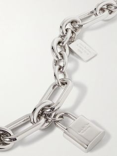 Acne Studios' 'Ainlock' chain necklace has been made in Italy and is comprised of substantial silver-tone links of various shapes and sizes. It's detailed with a hanging padlock charm and logo tag that's engraved with the brand name and founding year. Silver Chain Necklace With Lock, Luxury Silver Chain Necklace With Logo Charm, Chain Necklace For Men, Tom Ford Bag, Acne Shop, Logo Tag, Necklace For Men, Fine Jewelry Designers, Silver Chain Necklace