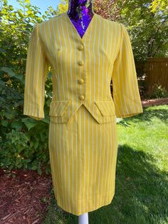 "1950s 1960s Yellow Pinstripe Skirt Suit Set Trude Junior California Sold locally here in Denver through the now defunct department store Gano-Downs. Material feels like a linen blend, lined in an off white acetate-like fabric. 3/4 sleeve. Faux/decorative pocket flaps. Skirt closure with a top button and plastic zip in back. Condition: Wonderful vintage condition. No concerns to note. Please note measurements below, taken with garment flat and doubled where appropriate. Fits like a modern size X Retro Fitted Skirt Suit, Retro Fitted Skirt Suit For Spring, Spongebob Costume, Pinstripe Skirt, 1950s Skirt, Pink Cotton Dress, Skirt And Jacket, Skirt Suit Set, Pinstripe Suit