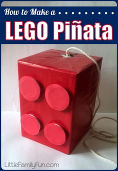 a red block with four circles on it and the words how to make a lego pinata