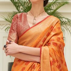 Orange colored saree is prettified with weaving patola work as shown which makes it appear classy. This saree is made of art silk fabric which is accompanied with art silk blouse piece which you can customise as per your design/style. Women can buy this saree to wear for their festive, sangeet and homely events and ideal for any fashionista. Note:- The actual product may differ slightly in color and design from the one illustrated in the images when compared with computer or mobile screen. Festive Orange Pre-draped Saree With Zari Weaving, Orange Banarasi Silk Pre-draped Saree For Diwali, Cotton Silk Pre-draped Saree For Puja With Zari Weaving, Slub Silk Saree With Detailed Pallu, Orange Handloom Blouse Piece For Navratri, Orange Tussar Silk Festive Saree, Orange Tussar Silk Saree For Festive Occasion, Festive Orange Tussar Silk Saree, Navratri Slub Silk Blouse Piece With Pallu