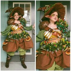 a woman dressed in costume standing next to a door