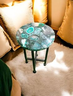 Agate table can be a stunning addition to your home decor, adding a touch of natural elegance and sophistication to your living space. Here are some popular ways to use an agate table in your home example, Dining Table, End Table, Side Table, Entryway Table, Nightstand, Home Office Desk etc. Note:- ⭐ Materials: Green Agate & Handmade Art ⭐ Shape: Round ⭐ Size: According To Size Variations ⭐ Pattern : Handmade Arts ⭐ We Can Accept Custom Order. ⭐ This is only Table Top & Base/Leg is not included. Side Table Entryway, Cafeteria Decor, Sofa Desk, Table Entryway, Coffee Table Top, Agate Table, Stone Coffee Table, Furniture Handmade, Table Nightstand