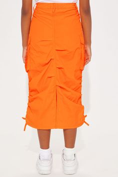 Available In Orange And Neon Pink. Maxi Skirt Solid Cargo Pockets Button Closure 100% Nylon Imported | Mini Nylon Cargo Maxi Skirt in Orange size 4 by Fashion Nova Spring Stretch Cargo Skirt, Casual Nylon Stretch Skirt, Casual Stretch Nylon Skirt, Casual Solid Nylon Skirt, Casual Nylon Skirt For Spring, Summer Nylon Skirt With Pockets, Spring Nylon Cargo Skirt With Pockets, Casual Nylon Lined Skirt, Orange Skirt Bottoms With Pockets