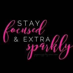 the words stay focused and extra sparkly on a black background with pink ink in it