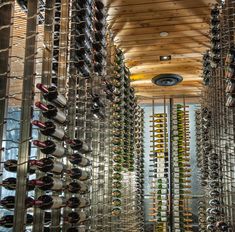 a room filled with lots of bottles of wine