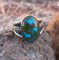 "This ring is made with Old Stock Turquoise from Turquoise Mountain in Kingman Arizona. It is set in all Sterling Silver 925. This is a Beautiful ring that can be worn and enjoyed for years to come, and it would make a wonderful gift for yourself or anyone who loves Turquoise and Sterling Silver!  It is set in a sterling silver bezel with a decorative feather ring band along the sides.   Ring size 13 Turquoise gemstone 22X15mm. Stamped with maker's mark \"BB\" and \"925\" Thank you for visiting Kingman Arizona, Feather Ring, Hippy Gifts, Kingman Turquoise, Blue Band, Maker's Mark, Beautiful Ring, Jewelry Inspo, Ring Band