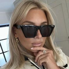 Cat eye bold style sunglasses classic rectangular shape with an angular upsweep Cat Eye Sunglasses Vintage, Black Cat Eye, Black Cat Eye Sunglasses, Cat Eye Sunglasses Women, Sunglasses Women Fashion, Black Cat Eyes, Style Sunglasses, Retro Sunglasses, Eyewear Accessories