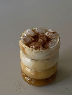 an iced drink sitting on top of two bananas