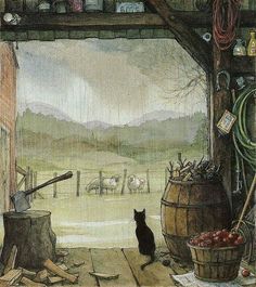 a black cat sitting on top of a wooden floor next to a barrel filled with fruit