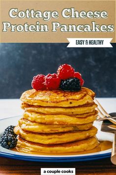 a stack of pancakes with berries on top and the title cottage cheese protein pancakes easy & healthy