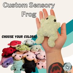 a hand holding a small stuffed animal in it's right hand with the caption, choose your colors