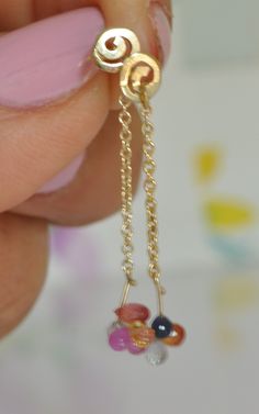 14k solid gold threader earrings. Long chain earrings. Gold chain and multi colors beads dangle earrings. Small spiral, dainty gold chain and 4 multicolored Tourmaline teardrops. This is a gentle gold earrings for woman that can be a beautiful love jewelry gift. ** 14k solid gold spirala ** 14k solid gold chain ** 4 teardrops Tourmaline ** The earrings are 1.5 inches My Shop: https://www.etsy.com/shop/malkaravinajewelry?ref=seller-platform-mcnav 14k Gold Briolette Earrings, Yellow Gold Earrings For Party, 14k Gold Dangle Linear Earrings As Gift, 14k Gold Dangle Linear Earrings For Gift, Yellow Gold Earrings With Adjustable Chain For Party, Yellow Gold Dangle Earrings With Adjustable Chain, Party Earrings In Yellow Gold With Adjustable Chain, Yellow Gold Dangle Threader Earrings For Party, Dainty Yellow Gold Briolette Earrings