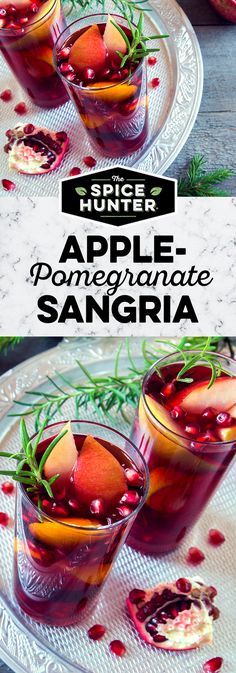 two glasses filled with apple pomegranate sangria on top of a white plate