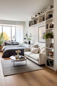 a living room filled with furniture and a large window