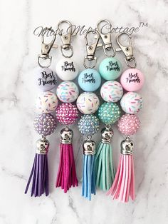 "This listing is for one Best Friends Beaded Keychain Charm. Made with strong cord, beautiful acrylic beads, tassel and a lobster clasp. (best friends bead is double sided.) Choose your favorite design from the drop down menu.   These make excellent gifts, party favors, etc.  They can be clipped to bags, zippers, keychains, planners, phone, cup, backpacks, and more!   Comes in an organza gift bag. Measures approximately 6\" in length. Ready to ship in one business day. Please message me with any Beaded Items, Keychain Crafts, How To Make Beaded Keychains, Bead Keychain Diy, Keychains Diy, Beaded Keychain Ideas, Bubblegum Beads Wholesale, Bead Keychain, Diy Crafts Keychain