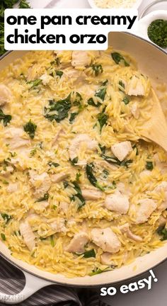 chicken orzo with spinach and parsley in a skillet