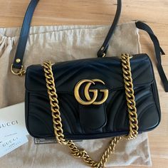 Only Used 1 Times To A Concert. Brand New In Great Condition. I Want To Clear My Closet. Gg Marmont Small Shoulder Bag Is At Gucci Stores For 1,800 Starting. Gold Metal Strap Can Be Shortened Completely Authentic. Have Authentication Id Badge Inside As Well. Don’t Miss In A Good Deal. Vintage Gucci Evening Bags, Timeless Gucci Shoulder Bag For Evening, Classic Gucci Bag With Chain Strap, Vintage Black Bag For Everyday Luxury, Gold Gucci Bag For Formal Occasions, Evening Gold Gucci Shoulder Bag, Designer Gucci Gold Bags, Gucci Gold Shoulder Bag, Gucci Gold Bag With Dust Bag