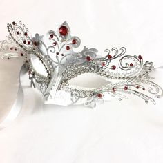 This mask captures the spirit of the clever and graceful fox, making it an ideal choice for those who appreciate its symbolism. Designed for hours of wear, it ensures you can enjoy the festivities in style and comfort. Adorned with rhinestones, this mask sparkles in the light, ensuring you'll shine bright at any masquerade ball, themed party, gala, and other events!


Age Group/Gender - Adult/Women

Size/Type - One size fits all adults

Mask Color - White/Silver

Mask Material - Polyresin/Laser Masquerade Mask Aesthetic, Fox Masquerade Mask, Prom Masquerade, Silver Masquerade Mask, Masquerade Mask Women, Mens Masquerade Mask, Venetian Masquerade Masks, Silver Mask, Mask Aesthetic