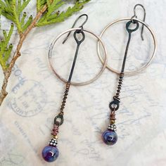 Entirely handcrafted in my Wisconsin home studio. Super fun mixed Metal and glass earrings that are beach- ready Truly, these are for ANY occasion or time of year! I created funky copper components, added art glass and bronze hoops for dimension. Bold, although lightweight.