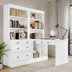 a white desk and bookcase in a room